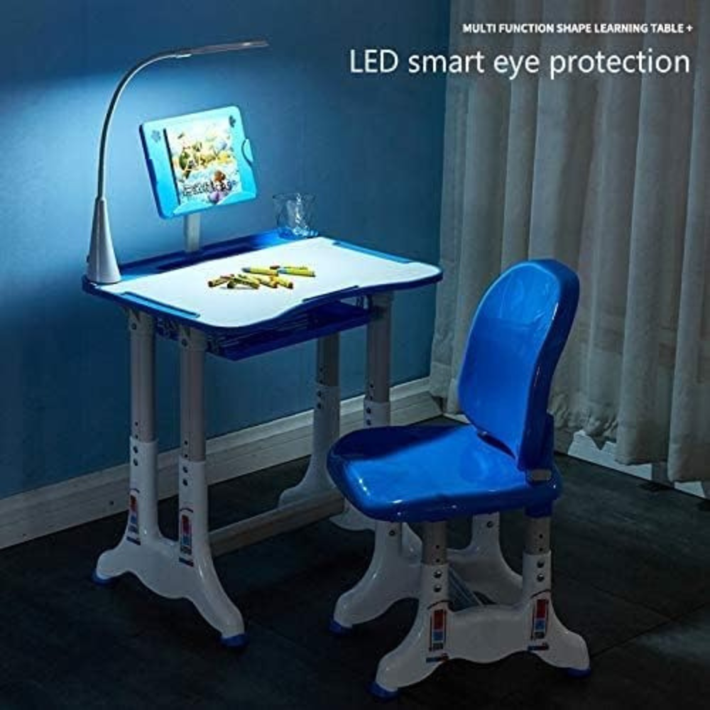 Children's learning table with LED light and chair in a room setting