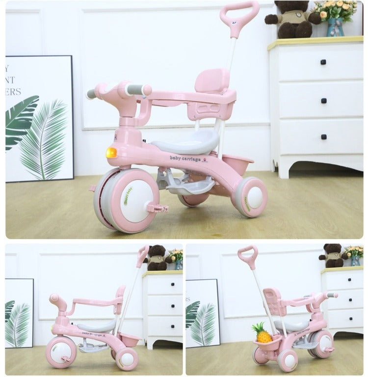 Pink baby tricycle with multiple views on a wooden floor.